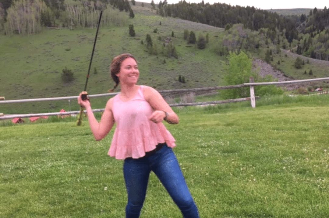 Tori learning to throw an atlatl